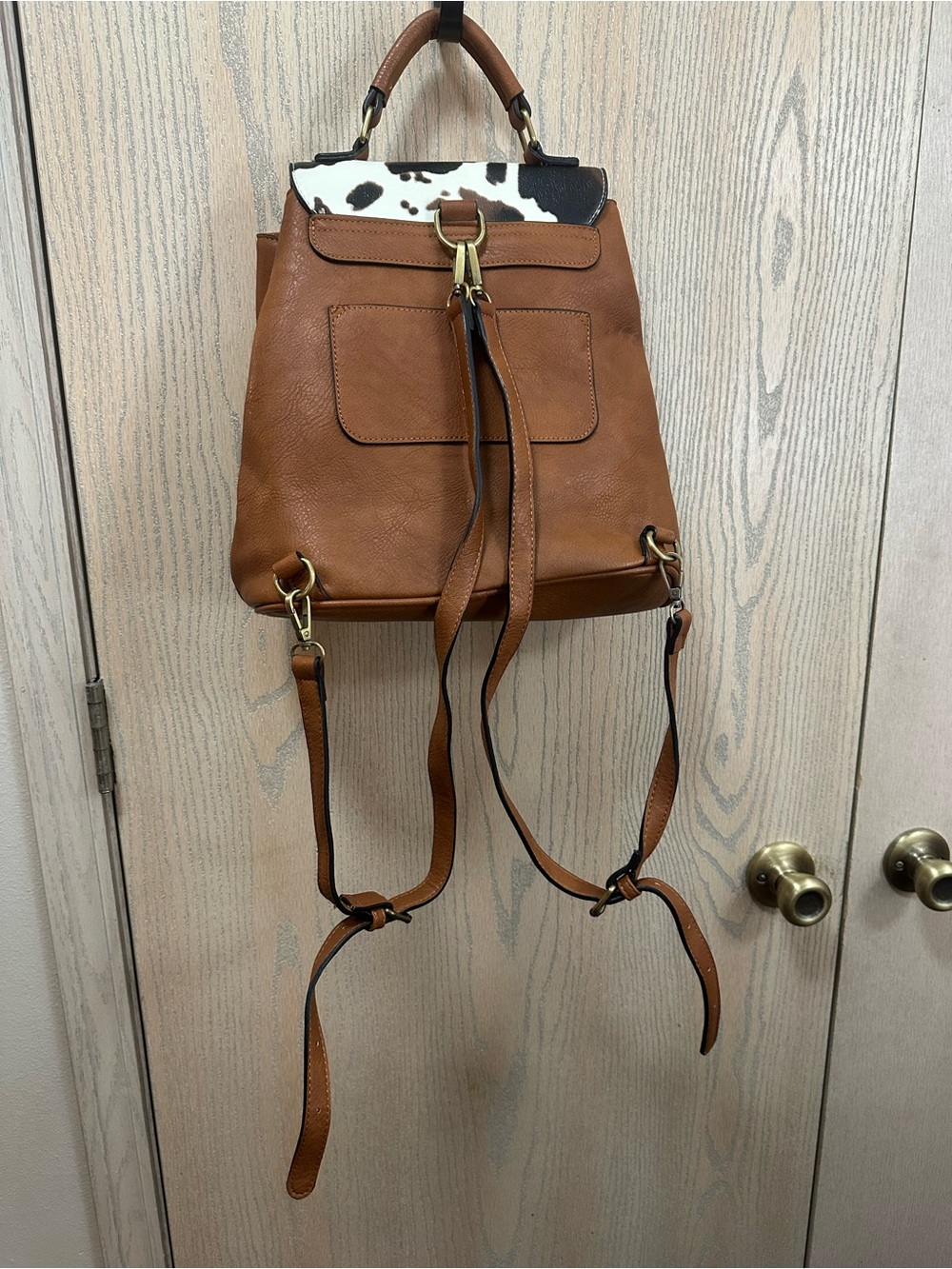 Jen & Co Brooks Convertible Cow Print Faux Leather Backpack - Picture 5 of 12